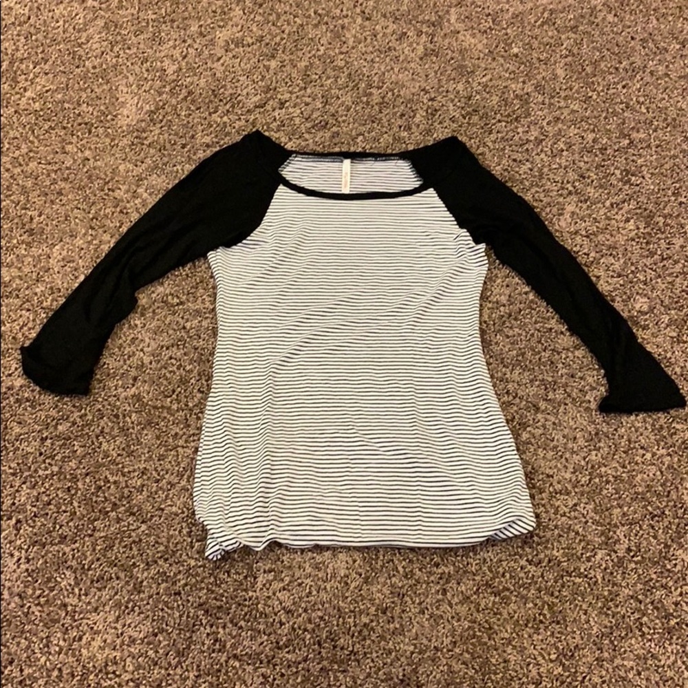 Black and white shirt w/ mid length sleeves